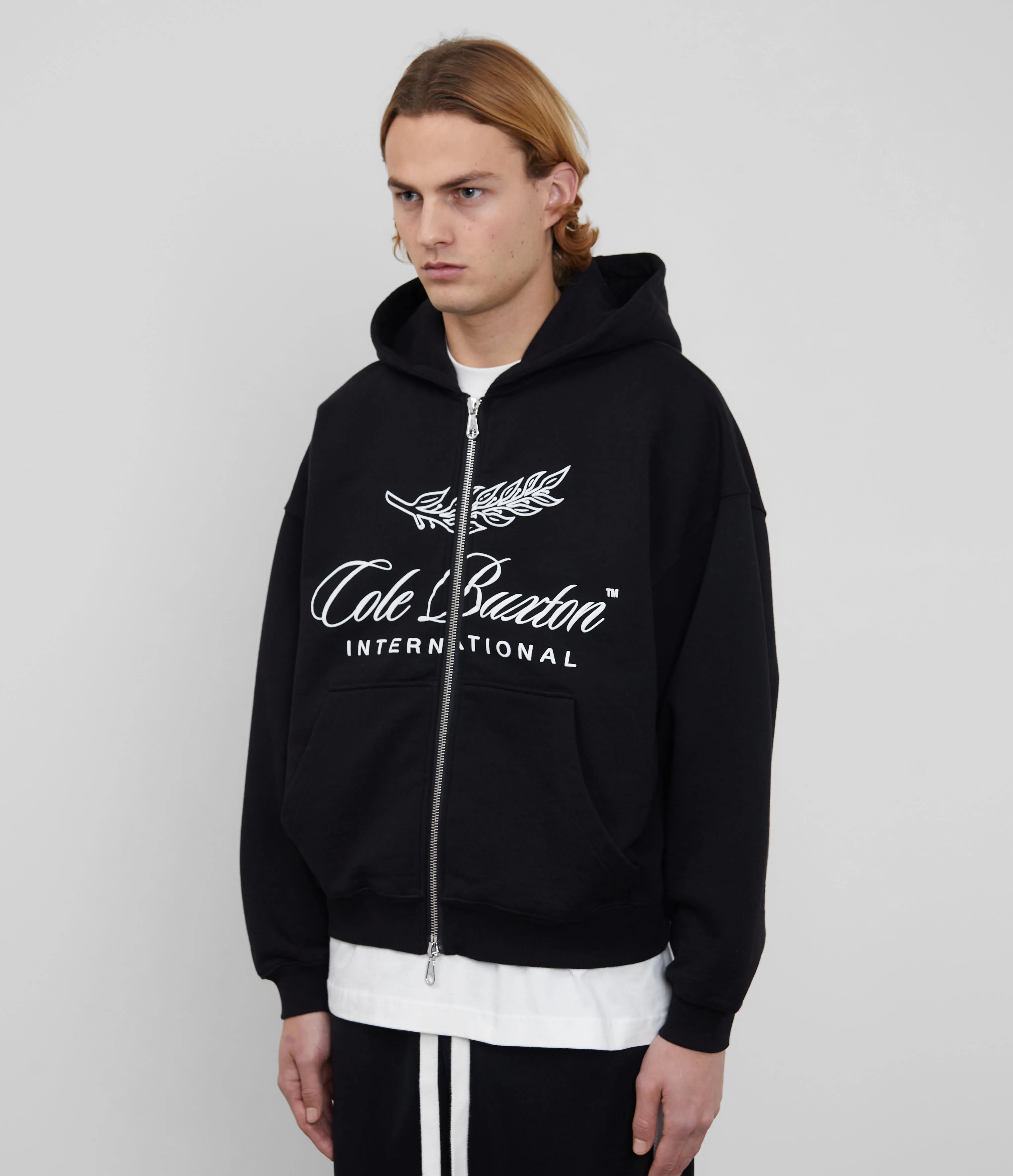 INTERNATIONAL ZIPPED HOODIE