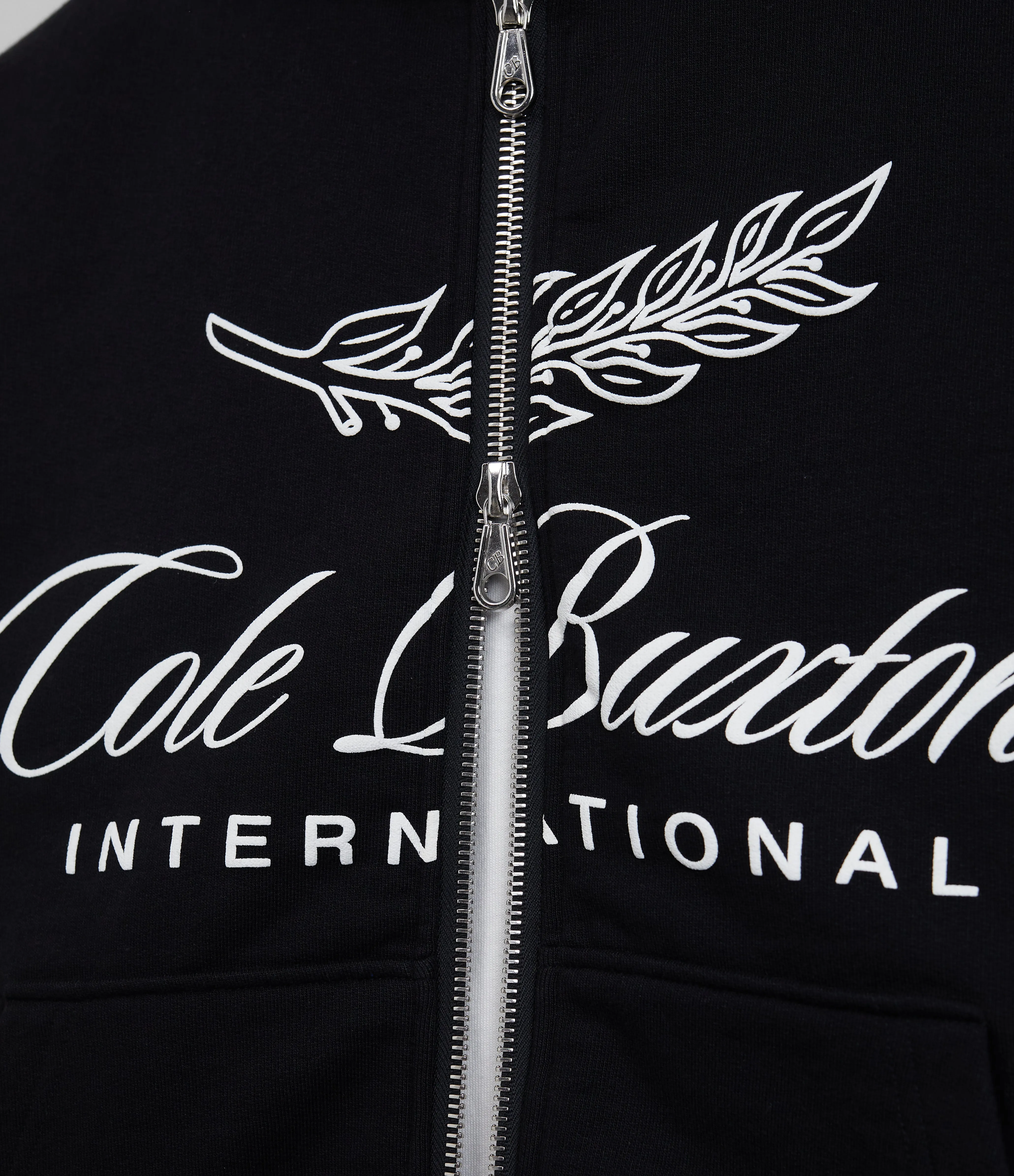INTERNATIONAL ZIPPED HOODIE