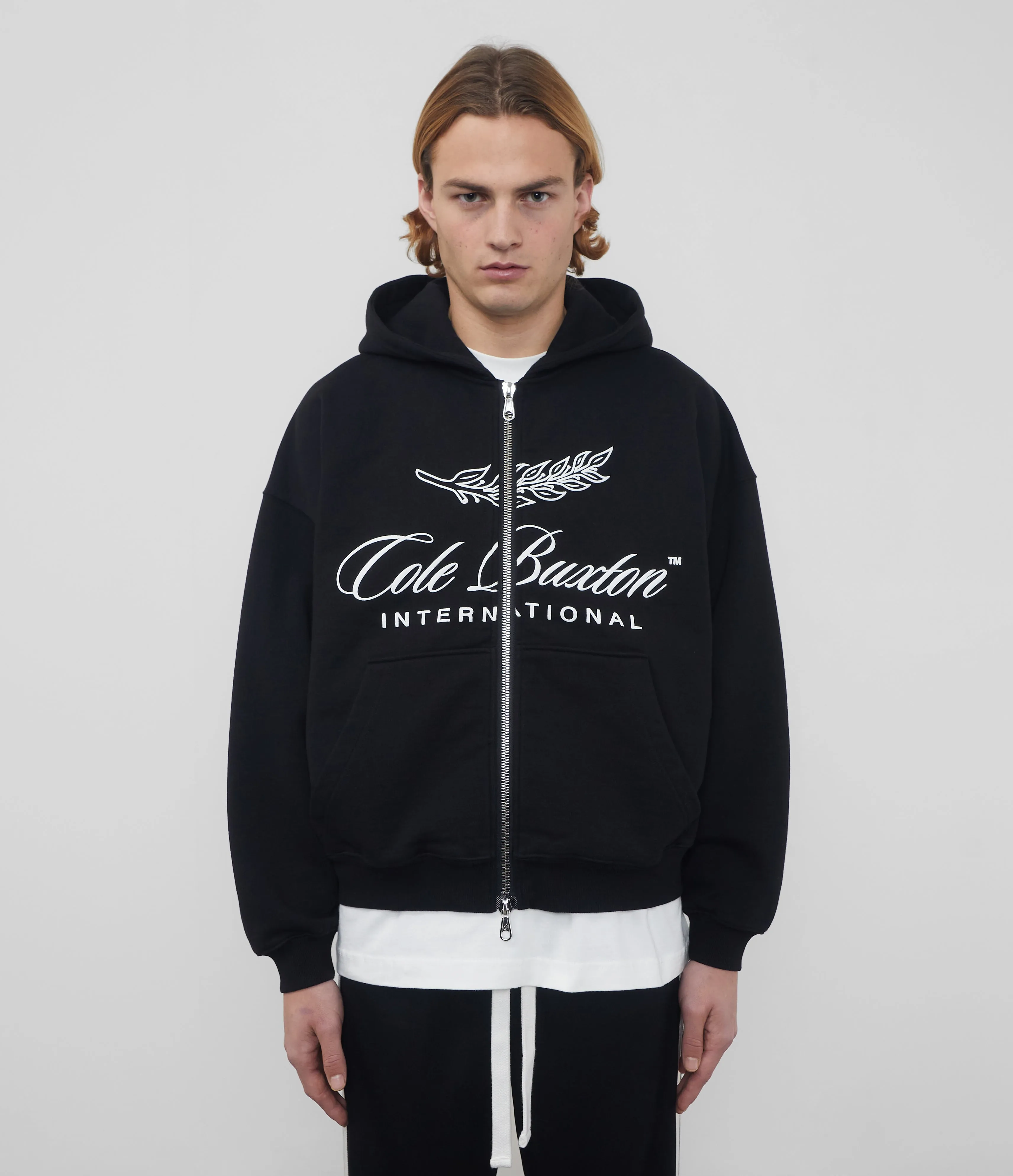 INTERNATIONAL ZIPPED HOODIE
